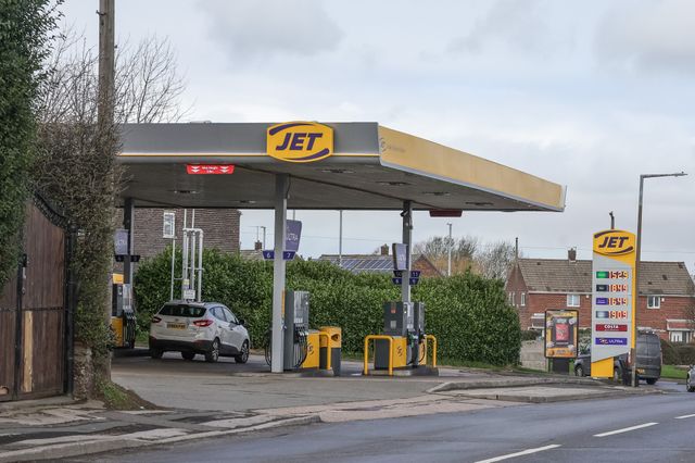 At the Jet fuel station on Burton Road in Monk Bretton, Barnsley, drivers are facing noticeably higher prices on Friday 27 March 2026, with unleaded petrol sitting at 152.9 pence per litre and diesel at 184.9 pence per litre. This compares unfavourably to the nearby supermarkets, where Asda is charging 143.9p for unleaded and 166.9p for diesel, while Morrisons offers unleaded at 142.9p and diesel at 167.9p, meaning local motorists are currently paying around 9 to 10 pence more per litre on petrol and up to 18 pence extra on diesel compared to just a short drive away at Jet Fuel Station, Burton Road, Barnsley, United Kingdom on 27 March 2026

(Photo by Mark Cosgrove/News Images)

