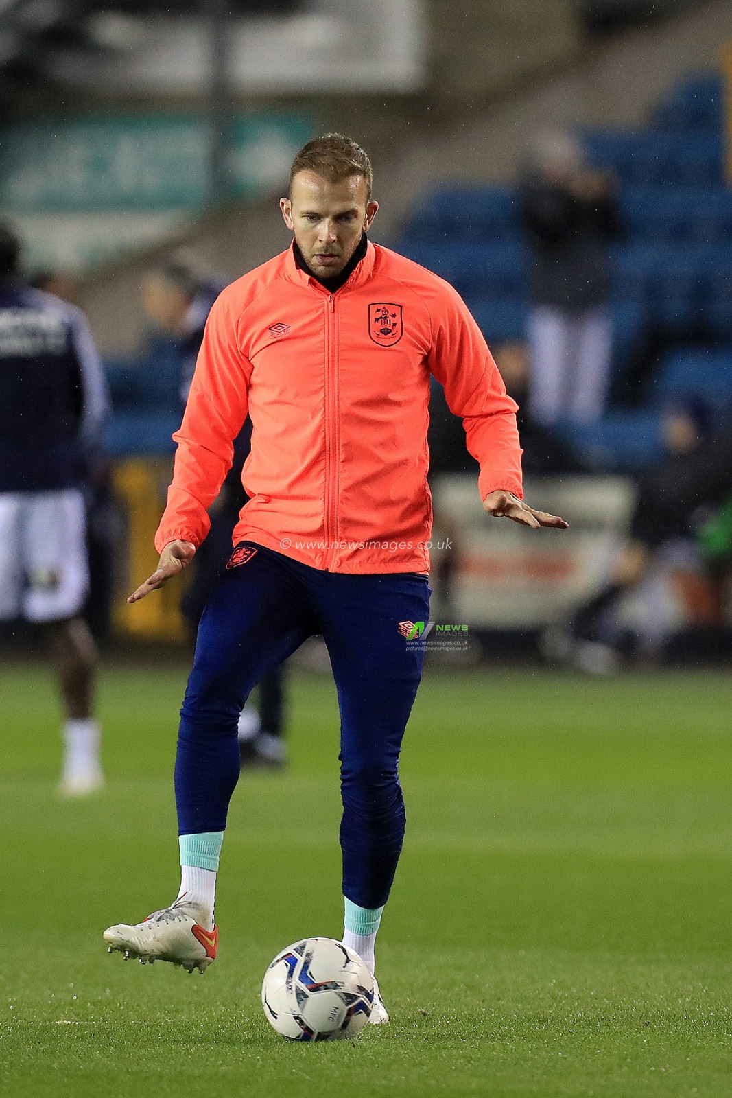 Jordan Rhodes #9 of Huddersfield Town warms up.