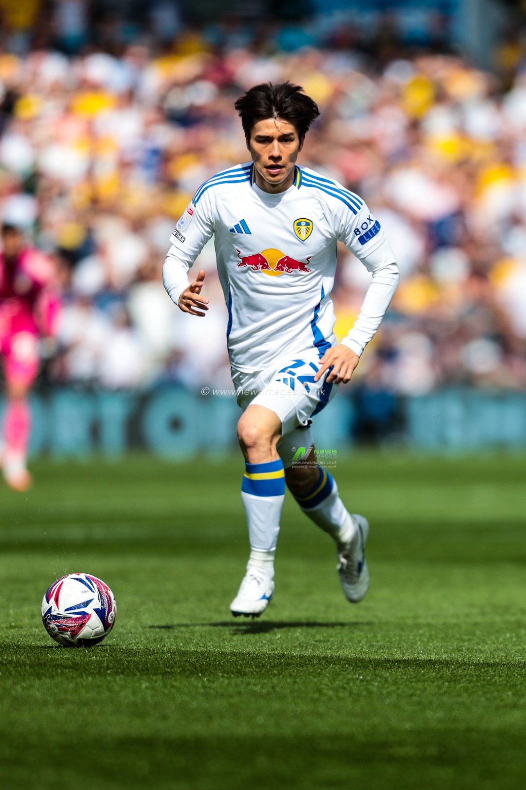 Ao Tanaka of Leeds United breaks with the ball during the Sky Bet Championship match Leeds United vs Preston North End at Elland Road, Leeds, United Kingdom, 12th April 2025

(Photo by Richard Bierton/News Images)