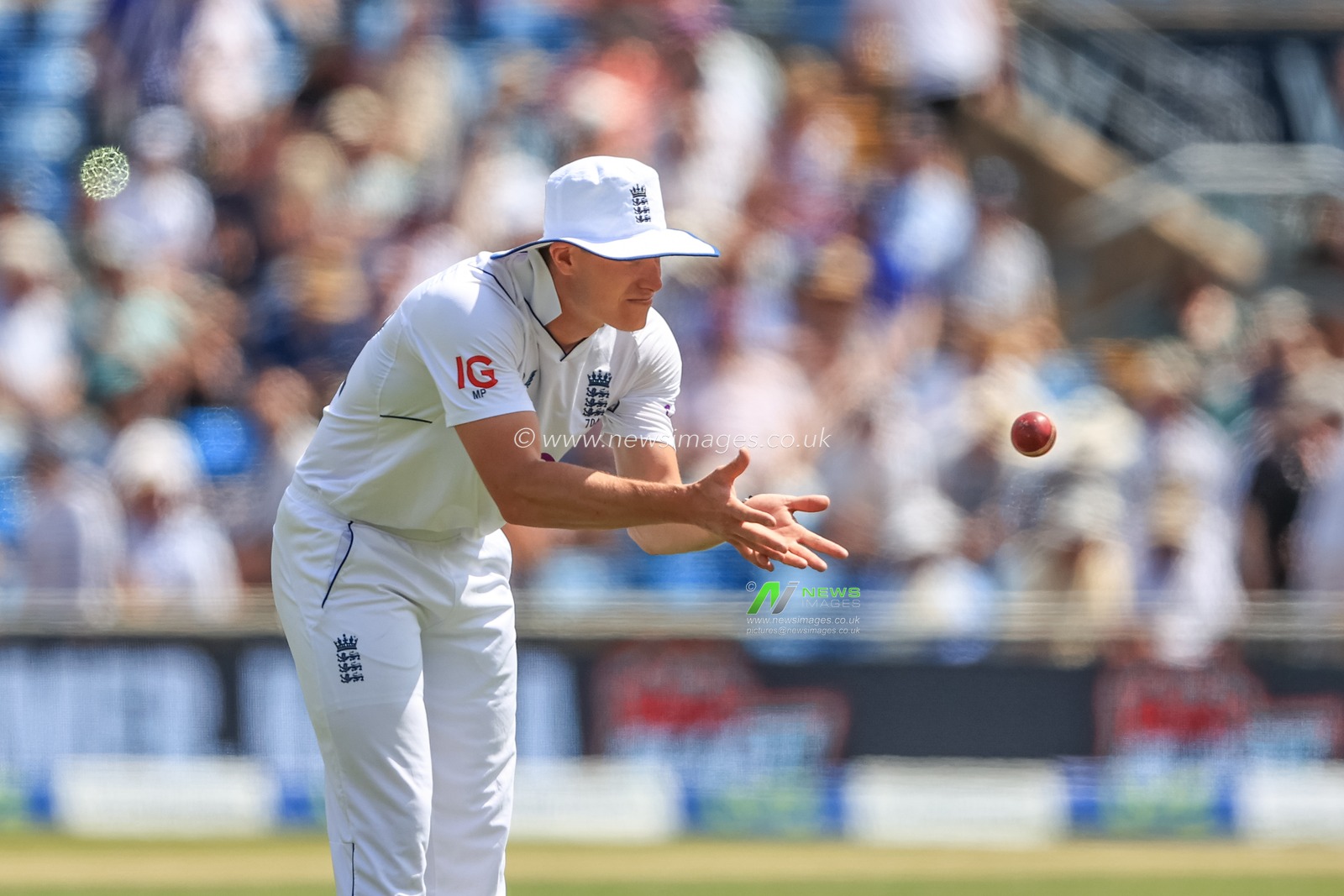 Matthew Potts of England catches the ball