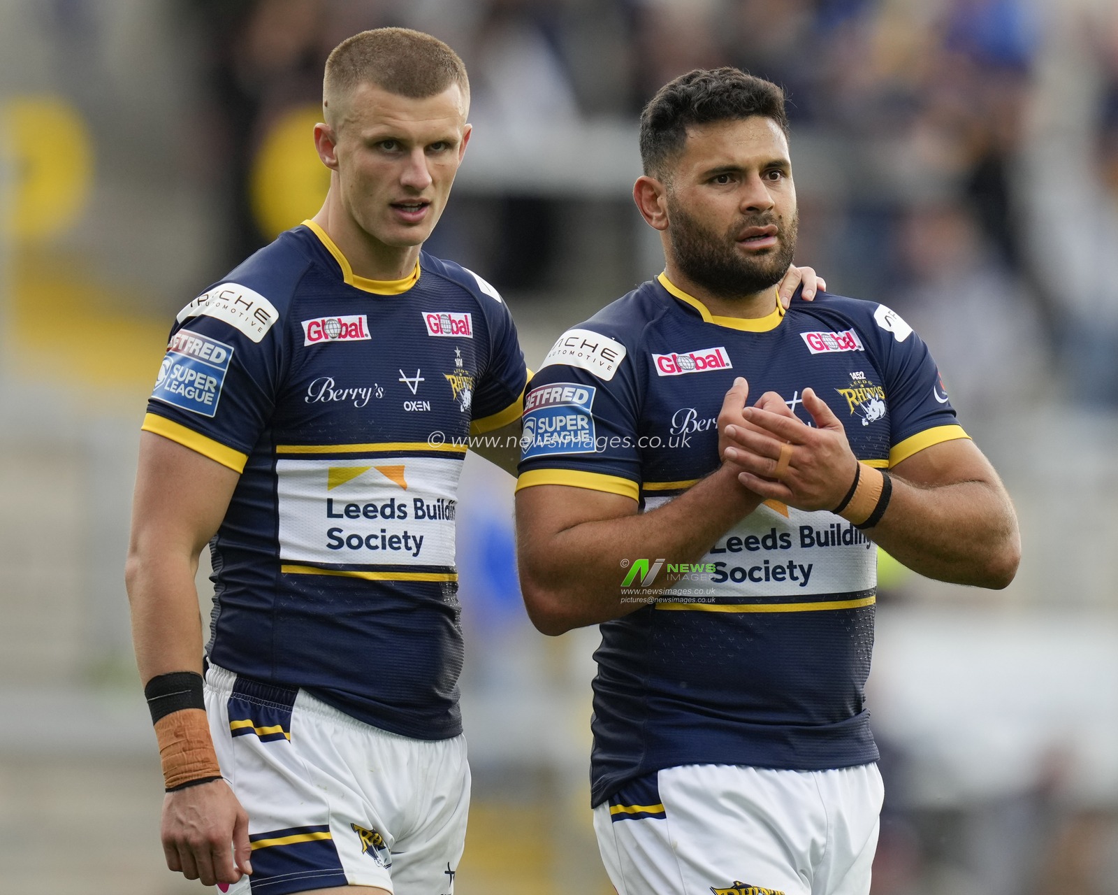 Ash Handley #5 of Leeds Rhinos and Rhyse Martin #12 of Leeds Rhinos salutes the fans after the Betfred Super League Round 21 match Leeds Rhinos vs Leigh Leopards at Headingley Stadium, Leeds, United Kingdom, 6th August 2023

(Photo by Steve Flynn/News Images)