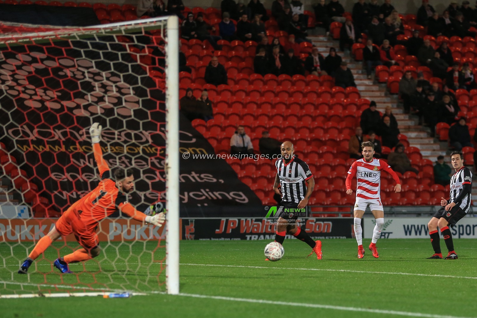 20th November 2018, Keepmoat Stadium, Doncaster, England; The Emirates FA Cup, Round 1, Doncaster Rovers v Chorley ;  Alfie May (19) of Doncaster scores to make it  1-0


Credit: Mark Cosgrove/News Images

English Football League images are subject to DataCo Licence