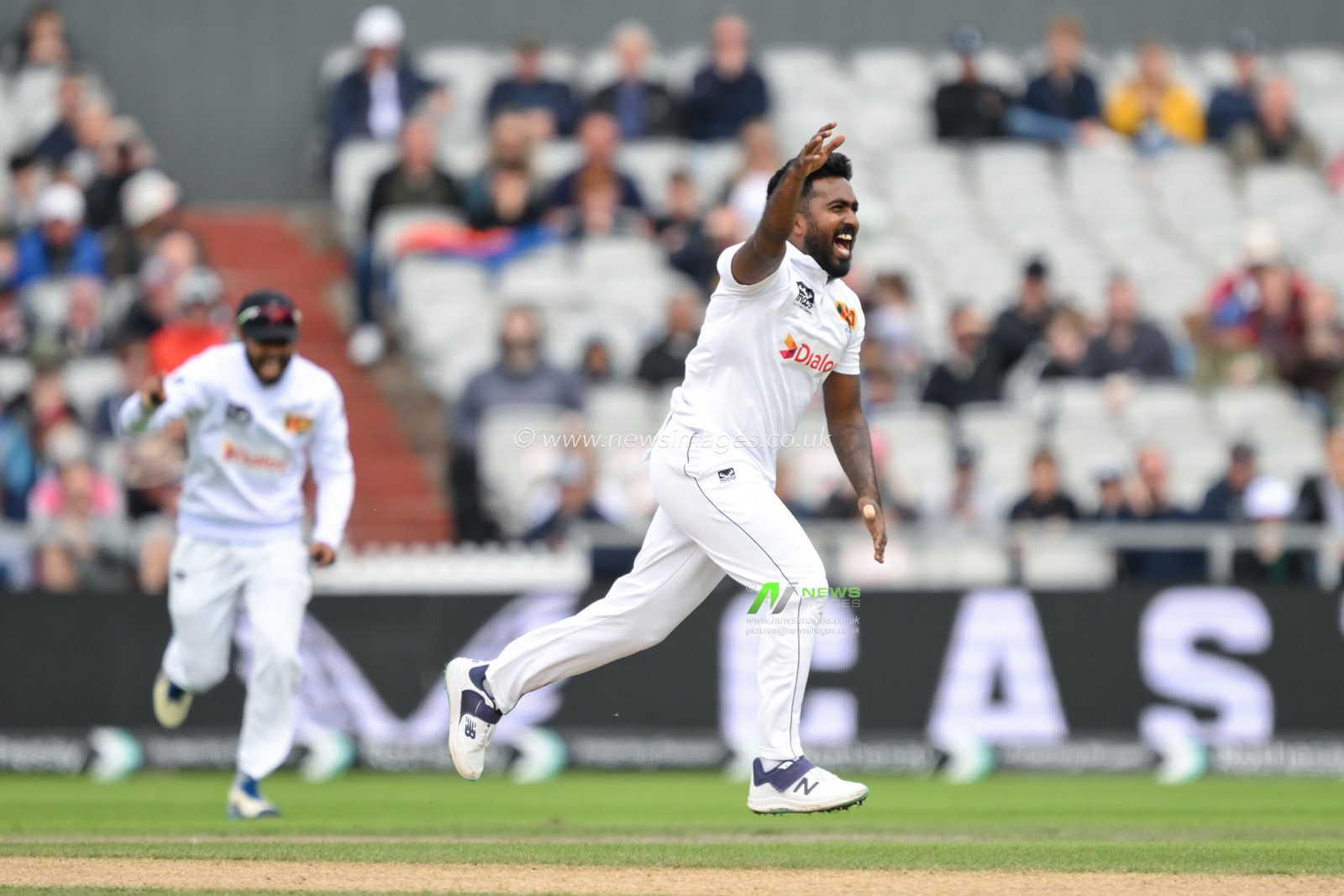 Asitha Fernando of Sri Lanka celebrates bowling out Ollie Pope of England during the England Men v Sri Lanka 1st Rothesay Test Match Day 2 at Old Trafford, Manchester, United Kingdom, 22nd August 2024

(Photo by Craig Thomas/News Images)