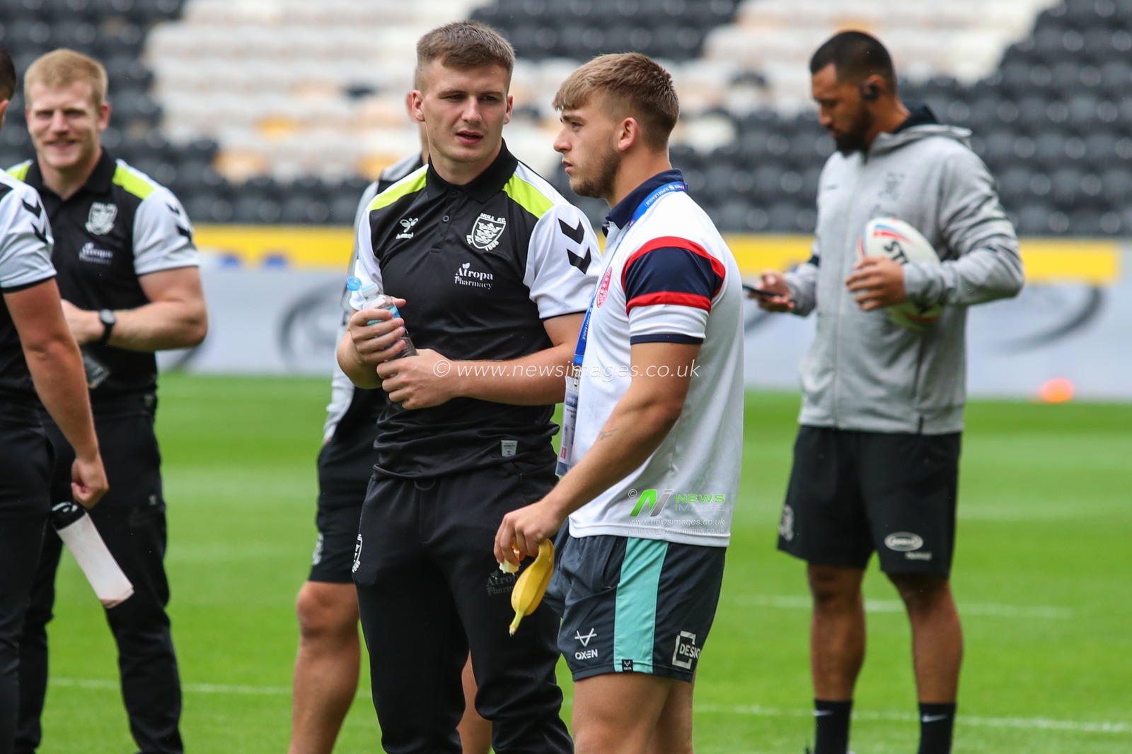Hull FC Connor Wynne and Hull KR Mikey Lewis chat before the kick off