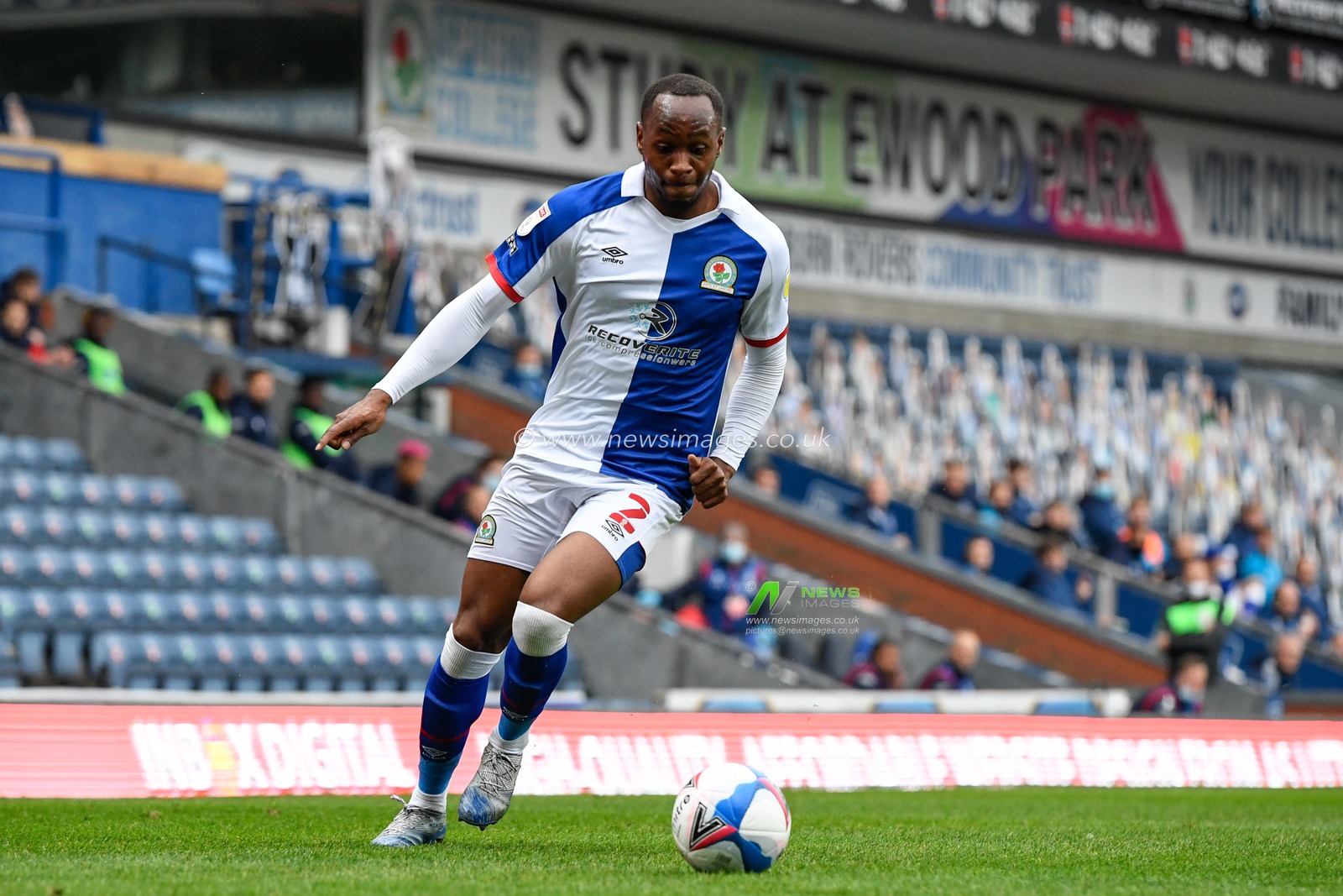 Ryan Nyambe (2) of Blackburn Rovers runs down the wing with the ball