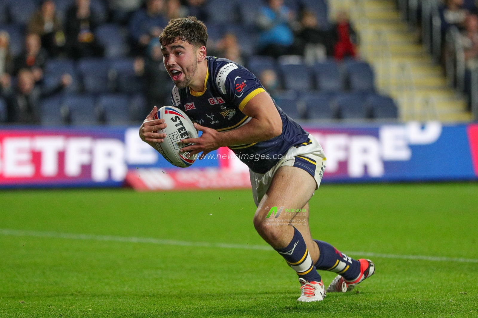 Jack Sinfield #29 of Leeds Rhinos celebrates his try and makes the score 24-0 in the first half of the Betfred Super League Round 27 match Leeds Rhinos vs Castleford Tigers at Headingley Stadium, Leeds, United Kingdom, 22nd September 2023

(Photo by James Heaton/News Images)