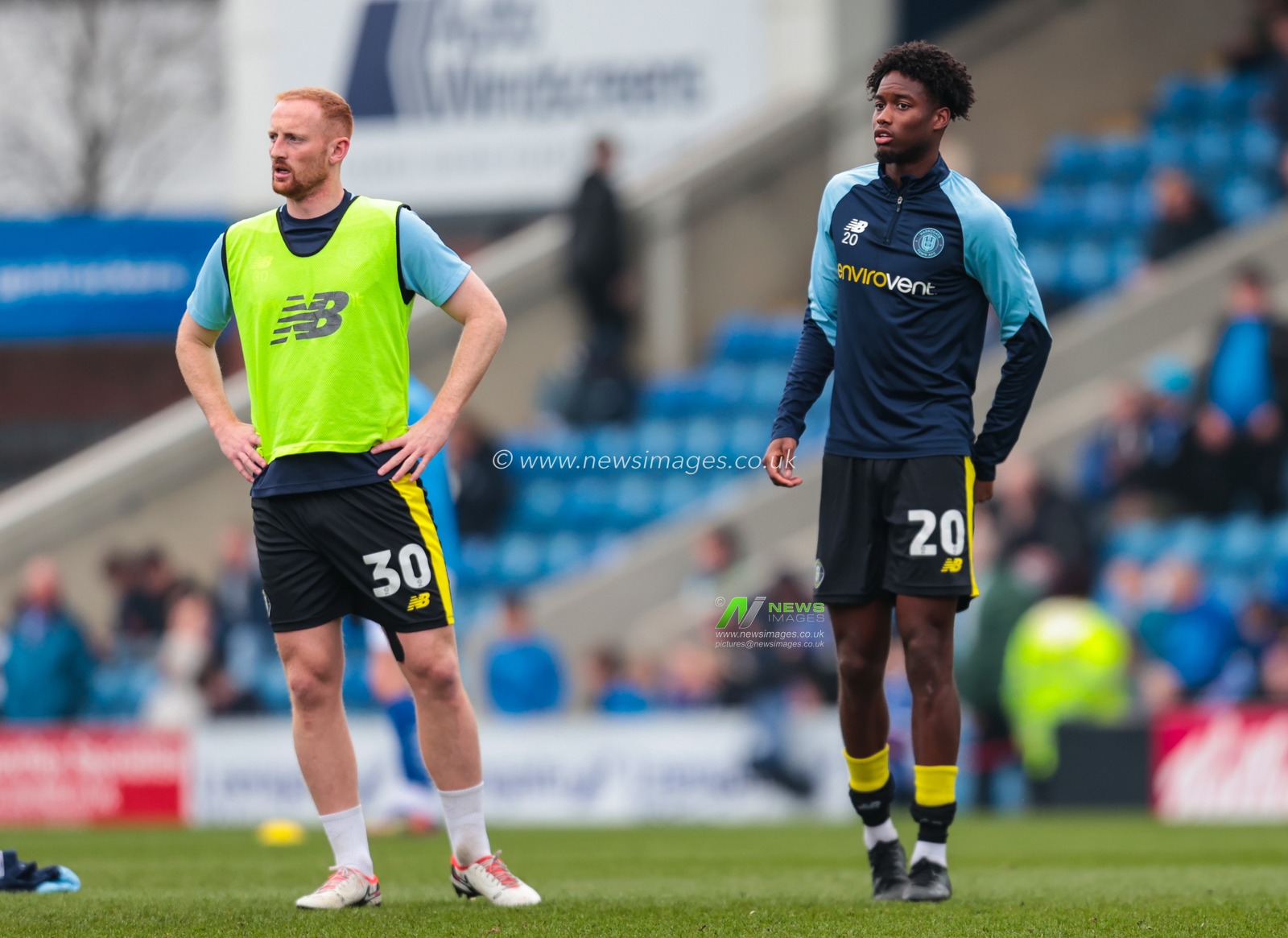 Liam Gibson of Harrogate Town  and Bryant Bilongo of Harrogate Town  in the pregame warmup session prior to the Sky Bet League 2 match Chesterfield vs Harrogate Town at SMH Group Stadiumact Stadium, Chesterfield, United Kingdom, 22nd March 2025

(Photo by Richard Bierton/News Images)