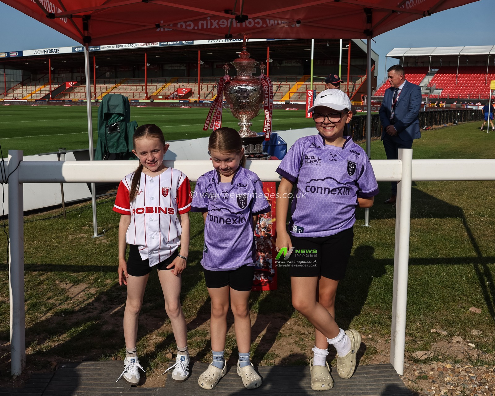 Hull KR fans have selfies with The Challenge Cup after Hull KR won the previous weekend during the Betfred Super League Round 14 Hull KR vs Catalans Dragons at Sewell Group Craven Park, Kingston upon Hull, United Kingdom, 13th June 2025

(Photo by Mark Cosgrove/News Images)