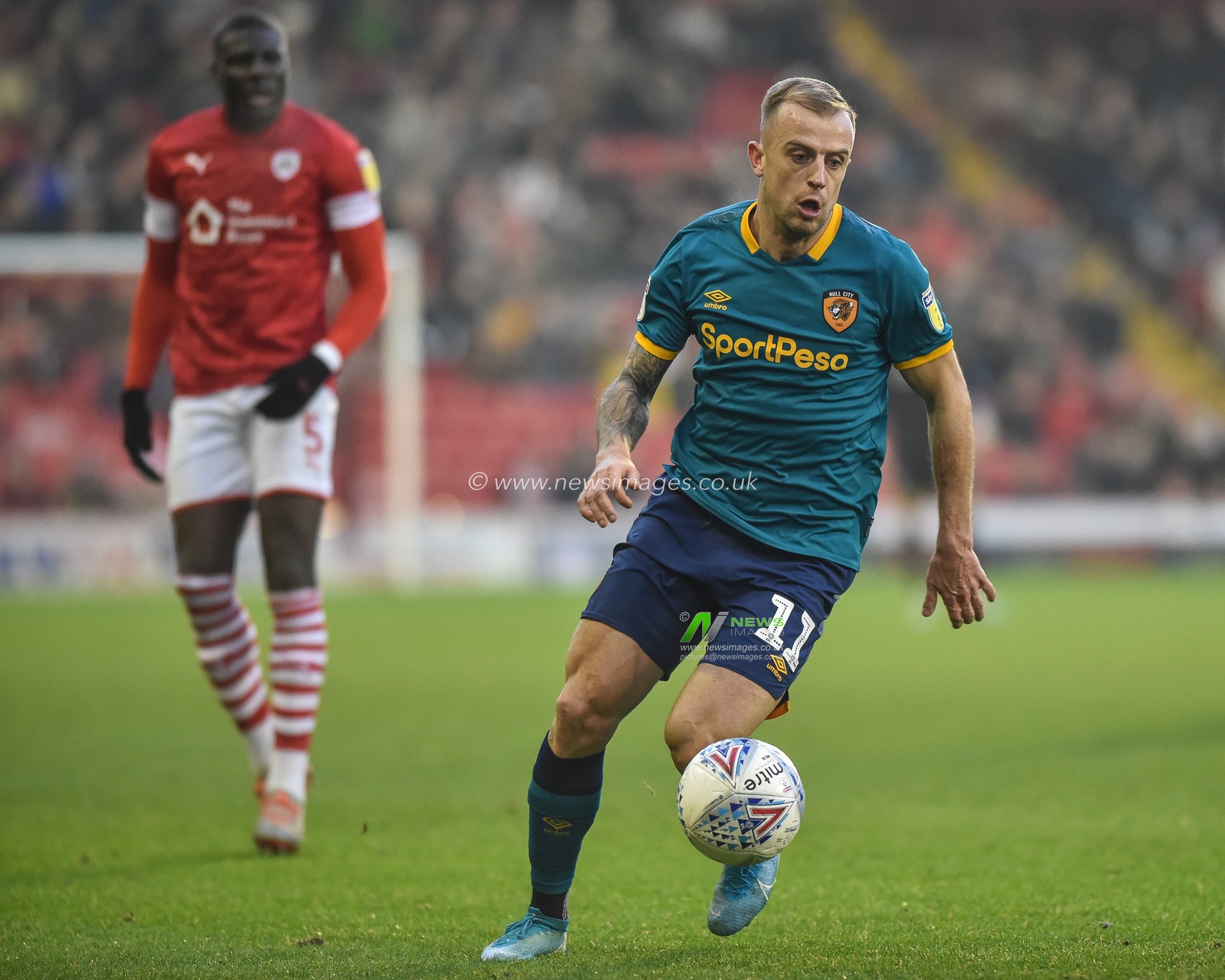 30th November 2019, Oakwell, Barnsley, England; Sky Bet Championship, Barnsley v Hull City : Kamil Grosicki (11) of Hull City with the ball 

Credit: Dean Williams/News Images