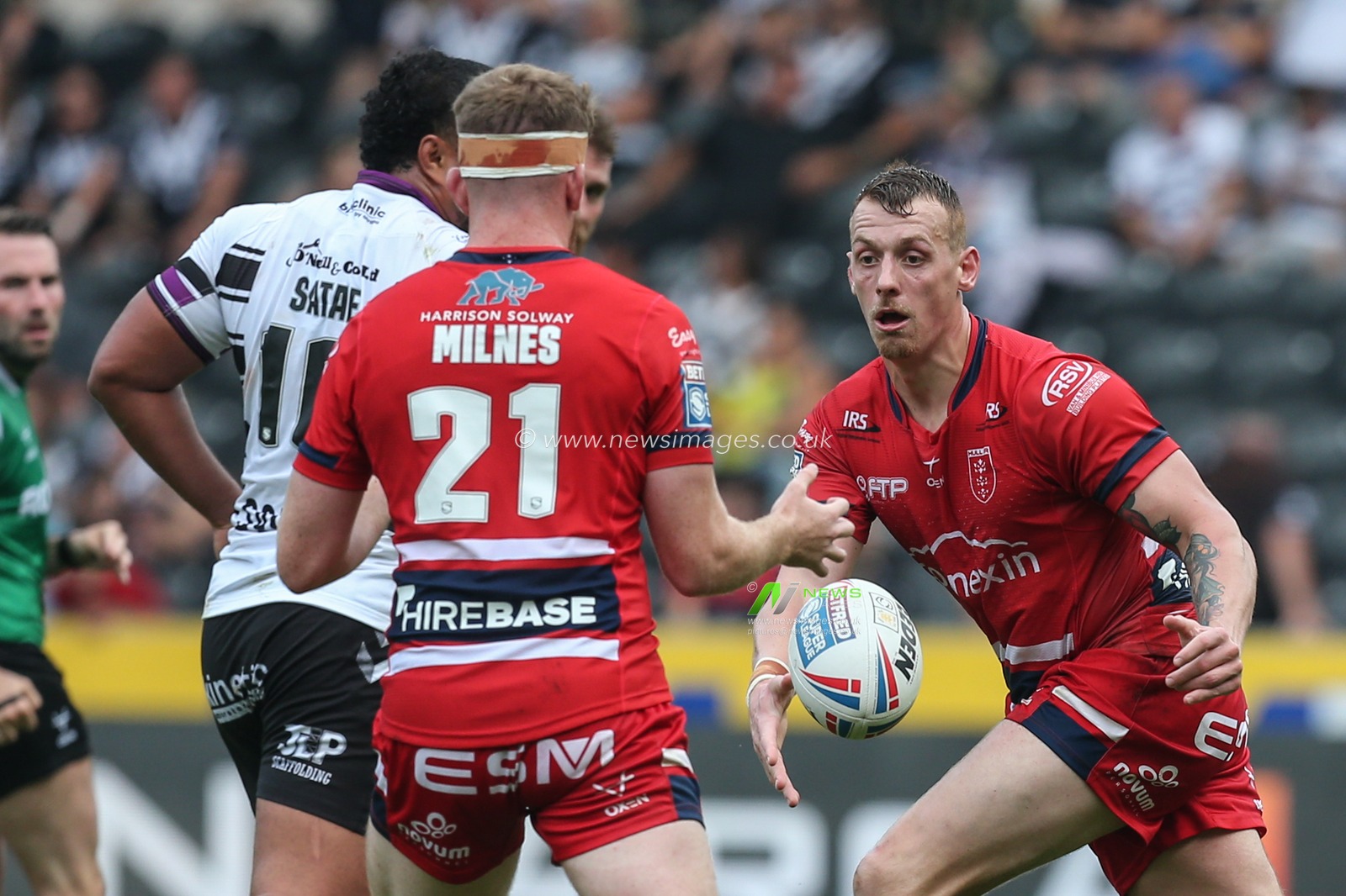 Frankie Halton #27 of Hull KR gets his pass away to Rowan Milnes #21 of Hull KR during the Betfred Super League match Hull FC vs Hull KR at MKM Stadium, Hull, United Kingdom, 3rd September 2022

(Photo by David Greaves Photos/ Via/News Images)