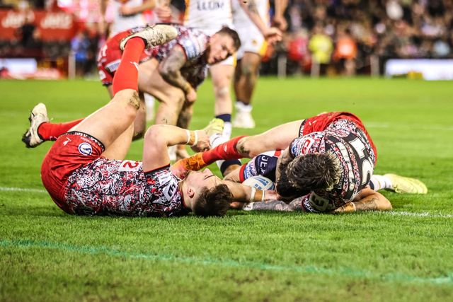 Charlie Staines of Catalans Dragons goes over for a try during the Betfred Super League match Leigh Leopards vs Catalans Dragons at Leigh Sports Village, Leigh, United Kingdom on 06 March 2026

(Photo by Alfie Cosgrove/News Images)