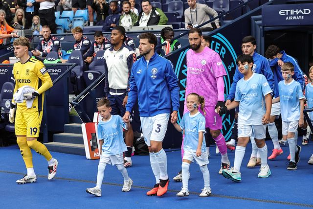 Ruben Dias of Manchester City leads his side out during the Premier League match Manchester City vs Coventry City at Etihad Stadium, Manchester, United Kingdom on 05 September 2026

(Photo by Mark Cosgrove/News Images)