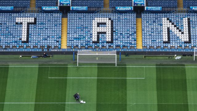 Ground staff mark the white lines around the penalty box during the Premier League match Leeds United vs Manchester City at Elland Road, Leeds, United Kingdom on 28 February 2026

(Photo by Mark Cosgrove/News Images)