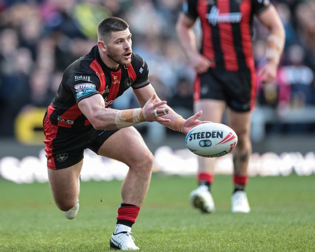 Danny Walker of Warrington Wolves offloads during the Betfred Super League round 6 match Leeds Rhinos vs Warrington Wolves at AMT Headingley Stadium, Leeds, United Kingdom on 29 March 2026

(Photo by Mark Cosgrove/News Images)