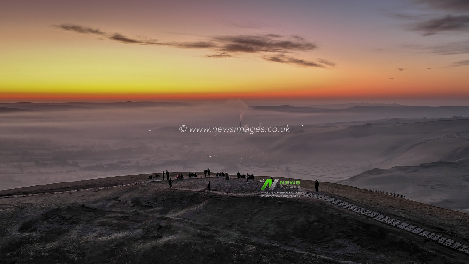 People head to the summit of Mam Tor to watch the sun rise as a blanket of fog lingers over the Hope Valley at Mam Tor, Peak District, United Kingdom, 19th March 2025

(Photo by Mark Cosgrove/News Images)