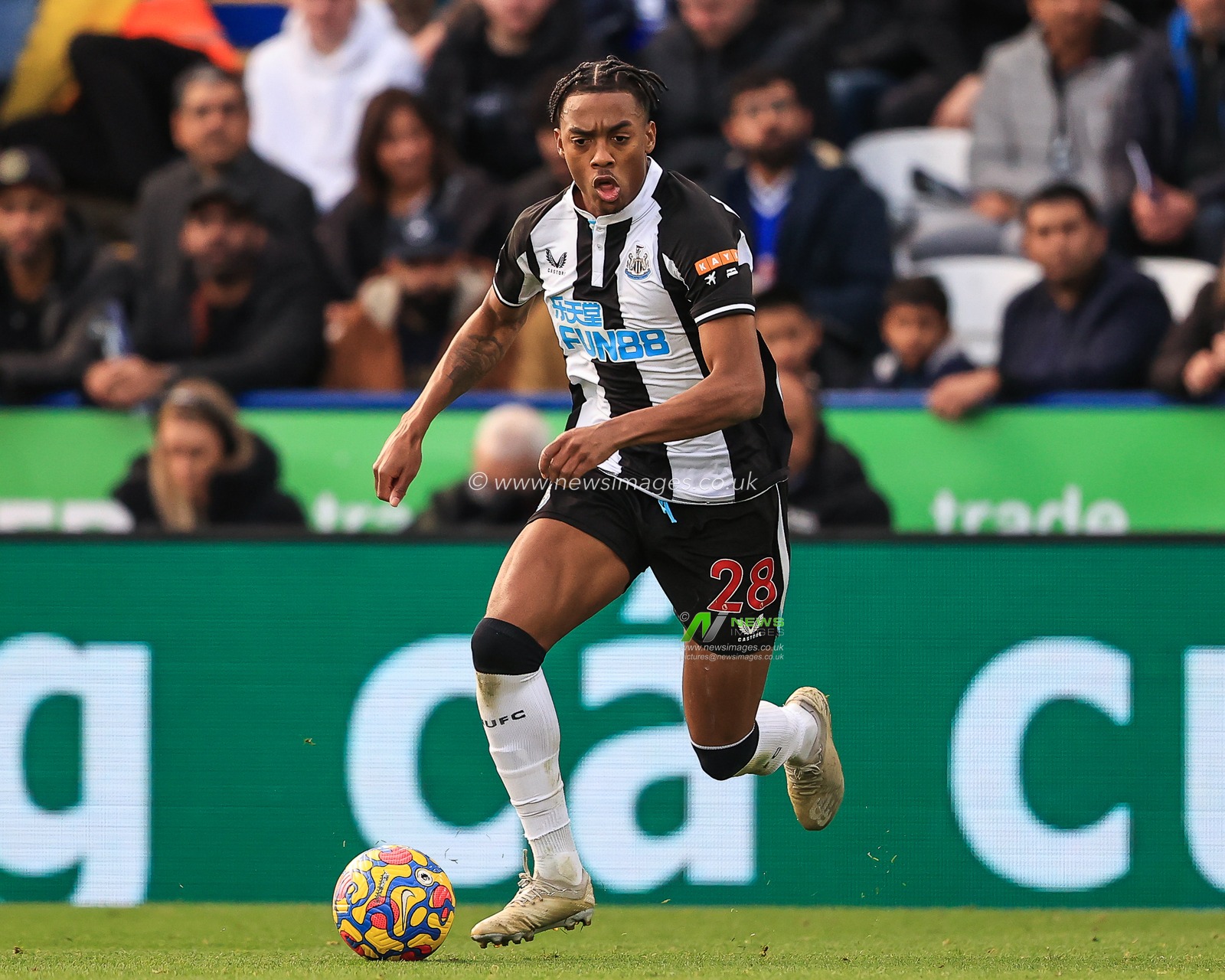 Karl Darlow #26 of Newcastle United makes a break with the ball