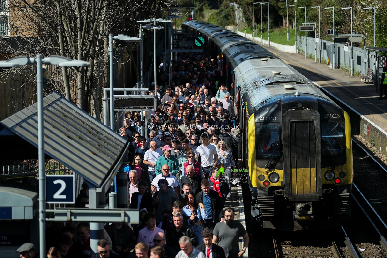Fans arrives at Kew Bridge Station prior to the Premier League match Brentford vs Chelsea at The Gtech Community Stadium, London, United Kingdom, 6th April 2025

(Photo by Izzy Poles/News Images)