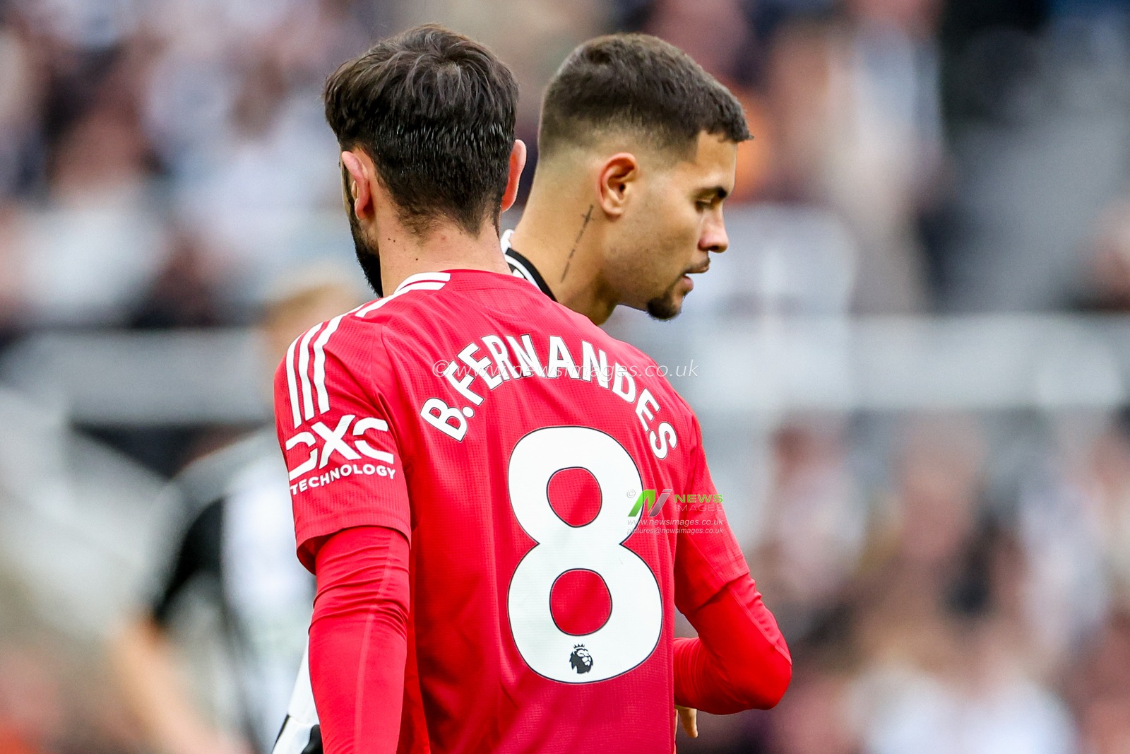 Bruno Guimaraes of Newcastle United shakes hands with Bruno Fernandes of Manchester United whilst Newcastle United fans sing â€˜thereâ€™s only one Brunoâ€™ during the Premier League match Newcastle United vs Manchester United at St. James's Park, Newcastle, United Kingdom, 13th April 2025

(Photo by Mark Cosgrove/News Images)
