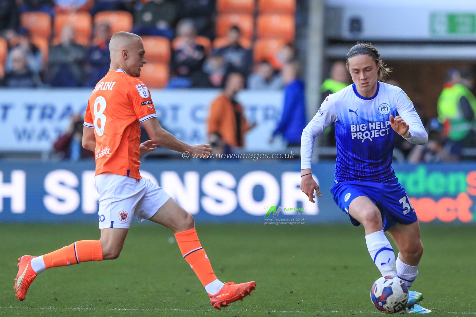 Lewis Fiorini #8 of Blackpool pressures Thelo Aasgaard #30 of Wigan Athletic during the Sky Bet Championship match Blackpool vs Wigan Athletic at Bloomfield Road, Blackpool, United Kingdom, 15th April 2023

(Photo by Alfie Cosgrove/News Images)