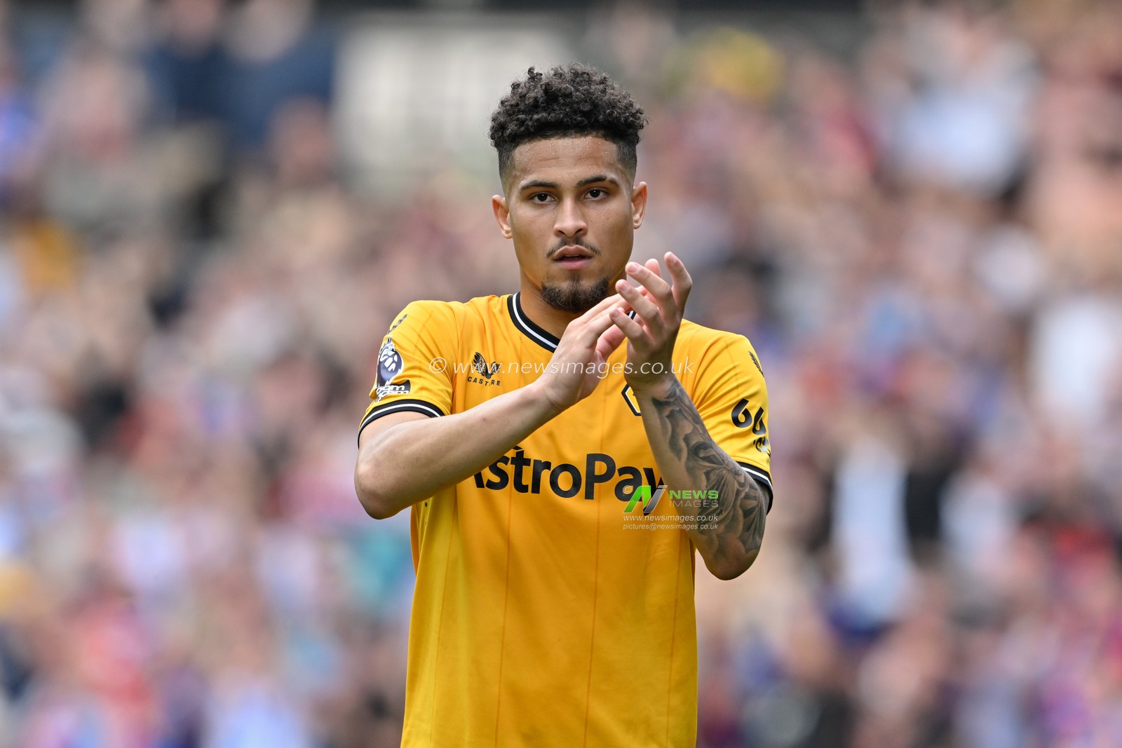 JoÃ£o Gomes of Wolverhampton Wanderers claps fans at full time, during the Premier League match Wolverhampton Wanderers vs Crystal Palace at Molineux, Wolverhampton, United Kingdom, 11th May 2024

(Photo by Cody Froggatt/News Images)