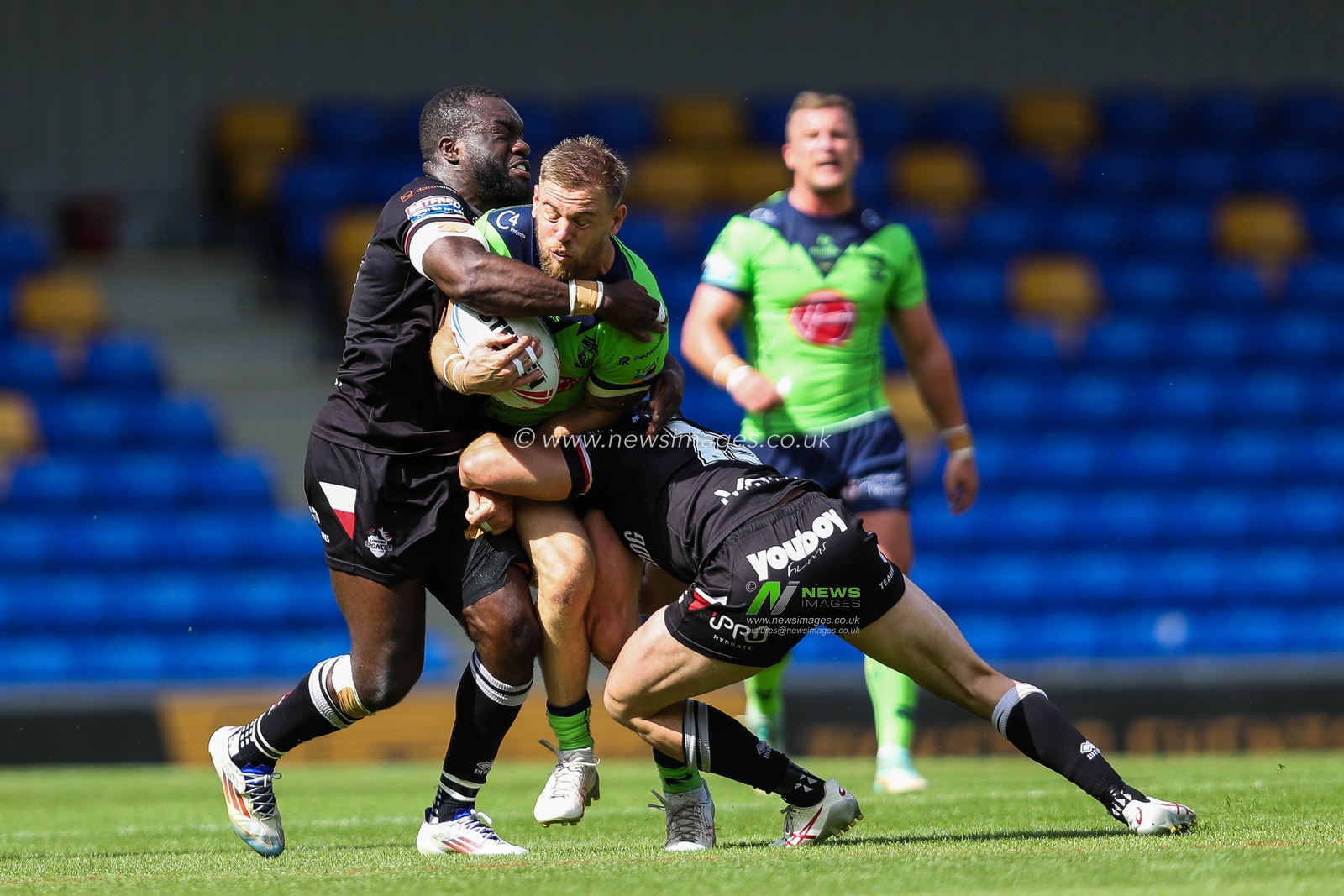 Matt Dufty of Warrington Wolves is tackled during the Betfred Super League Round 21 match London Broncos vs Warrington Wolves at Plough Lane, Wimbledon, United Kingdom, 11th August 2024

(Photo by Izzy Poles/News Images)