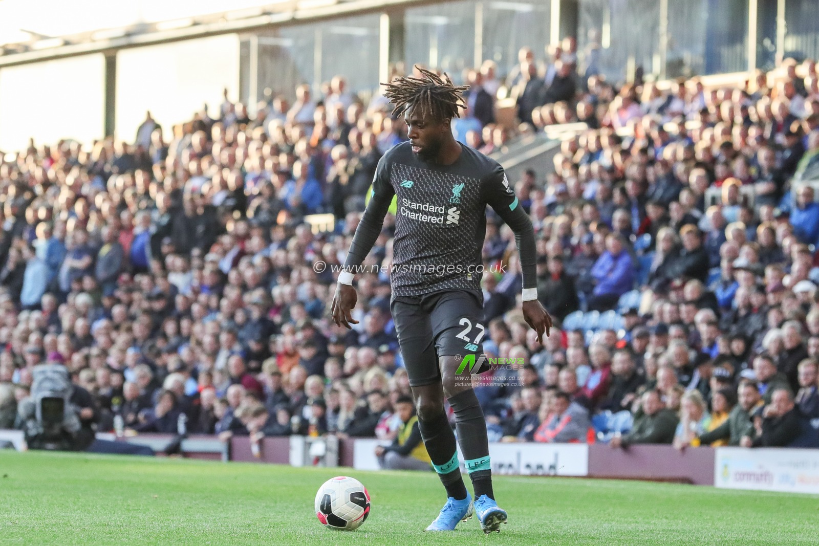 31st August 2019, Turf Moor, Burnley, England ; Premier League Football, Burnley vs Liverpool : Divock Origi (27) of Liverpool during the game

Credit: Mark Cosgrove/News Images

English Football League images are subject to DataCo Licence