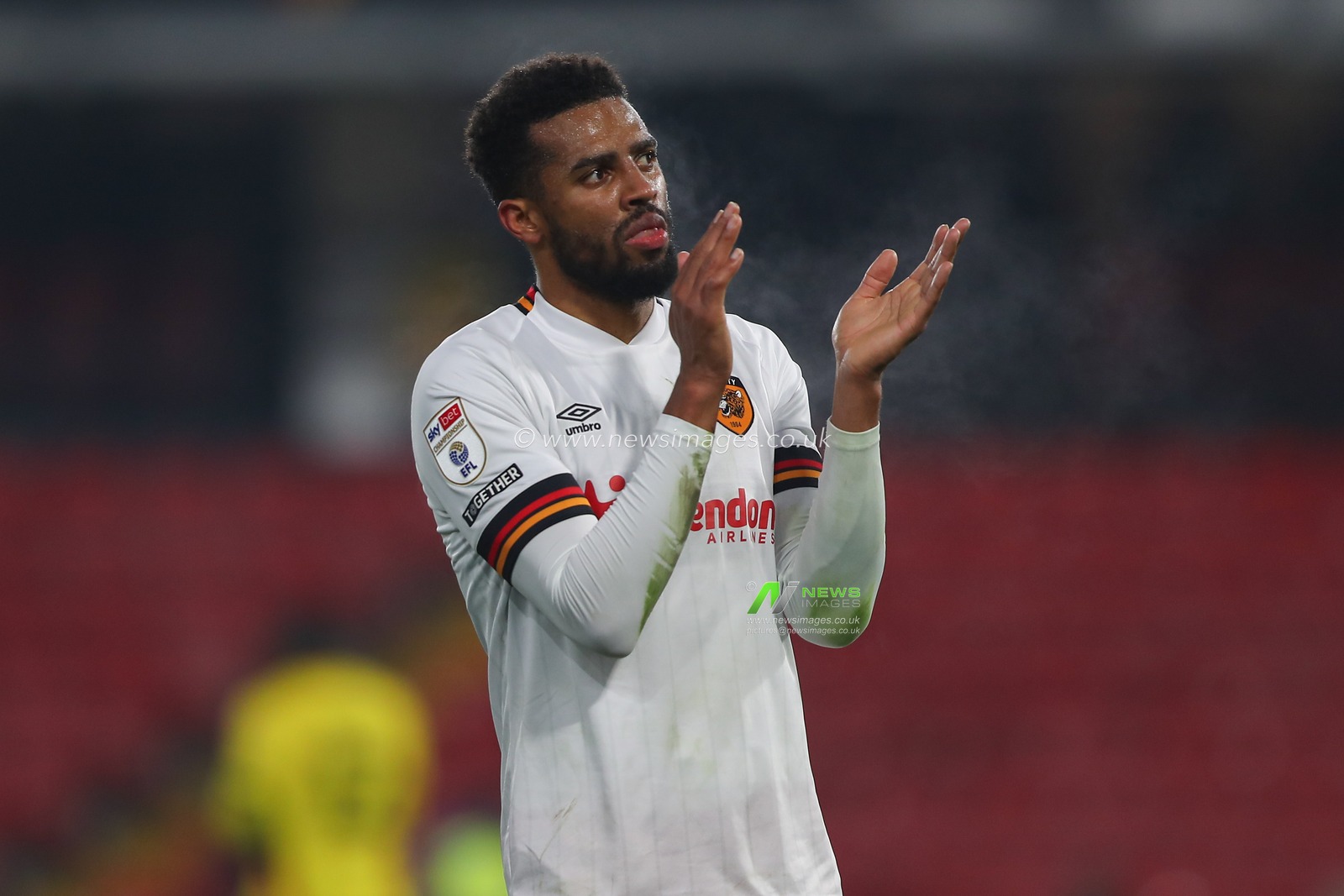 Cyrus Christie #33 of Hull City applauds the travelling fans after the Sky Bet Championship match Watford vs Hull City at Vicarage Road, Watford, United Kingdom, 11th December 2022

(Photo by Gareth Evans/News Images)