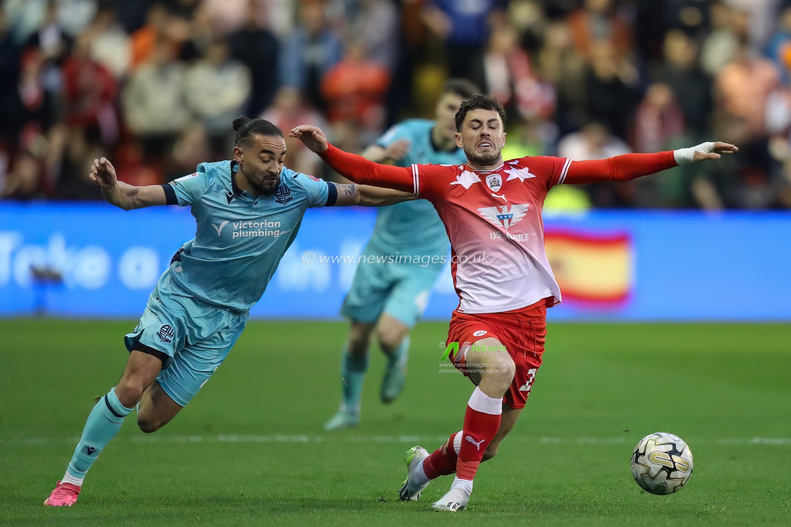 Randell Williams of Bolton Wanderers fouls Corey O'Keeffe of Barnsley during the Sky Bet League 1 Sky Bet League 1 Promotion Play-offs Semi-final first leg match Barnsley vs Bolton Wanderers at Oakwell, Barnsley, United Kingdom, 3rd May 2024

(Photo by Alfie Cosgrove/News Images)