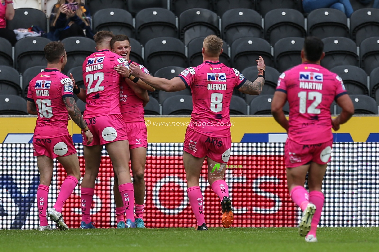 Ash Handley #5 of Leeds Rhinos celebrates his try to make the score 16-50