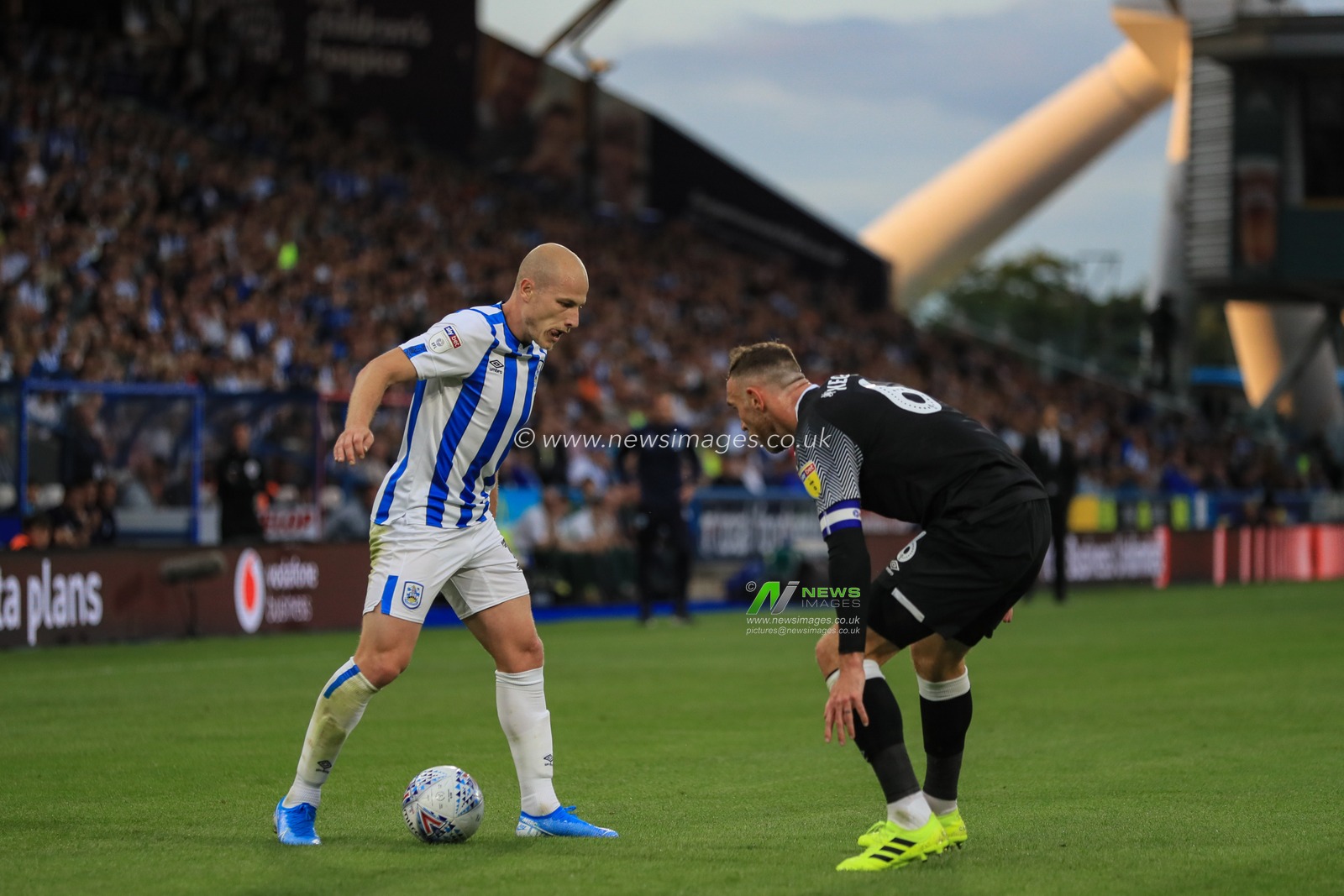 5th August 2019, John Smiths Stadium, Huddersfield England; Sky Bet Championship, Huddersfield Town vs Derby County ; Aaron Mooy (10) of Huddersfield Town looks for a way past Richard Keogh (6) of Derby County 


Credit: Mark Cosgrove/News Images

English Football League images are subject to DataCo Licence