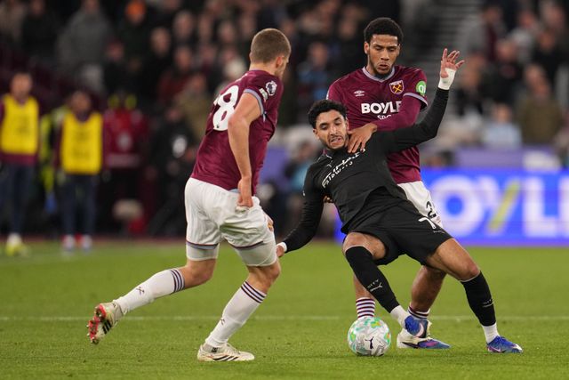 Omar Marmoush of Manchester City and Jean-Clair Todibo of West Ham United battle during the Premier League match West Ham United vs Manchester City at London Stadium, London, United Kingdom on 14 March 2026

(Photo by Harvey Murphy/News Images)