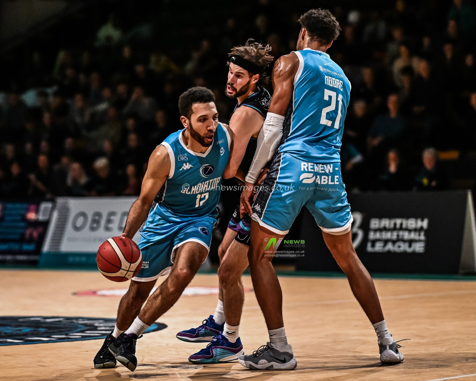 Patrick Whelan #12 of Caledonia Gladiators drives past Taylor Johnson #11 of Plymouth City Patriots during the British Basketball Championship match Plymouth City Patriots vs Caledonia Gladiators at Plymouth Pavilions, Plymouth, United Kingdom, 3rd November 2023

(Photo by Craig Thomas/News Images)
