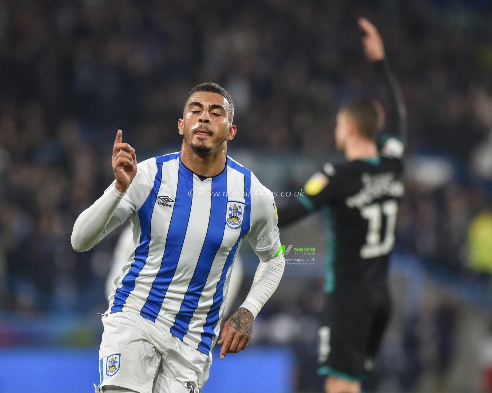 26th November 2019, John Smith's Stadium, Huddersfield, England; Sky Bet Championship, Huddersfield Town v Swansea City : Karlan Grant (16) of Huddersfield Town celebrates scoring the equalising goal to make it 1-1 at half time.

Credit: Dean Williams/News Images