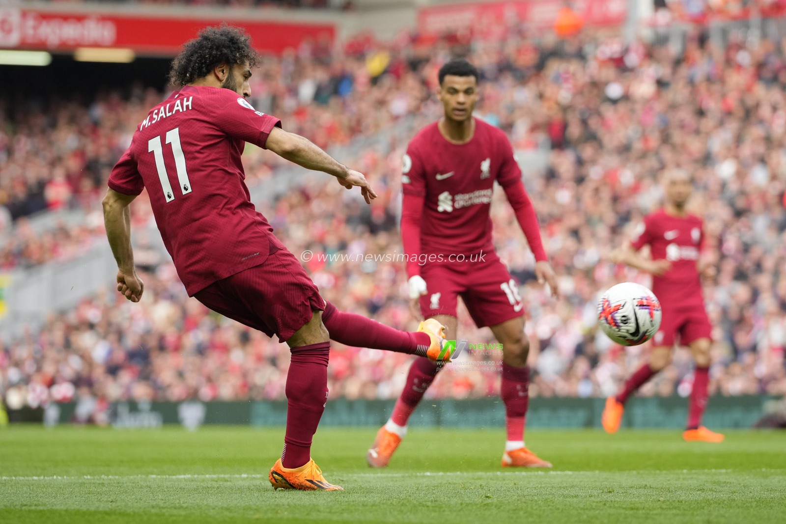 Mohamed Salah #11 of Liverpool shoots goal wards during the Premier League match Liverpool vs Brentford at Anfield, Liverpool, United Kingdom, 6th May 2023

(Photo by Steve Flynn/News Images)
