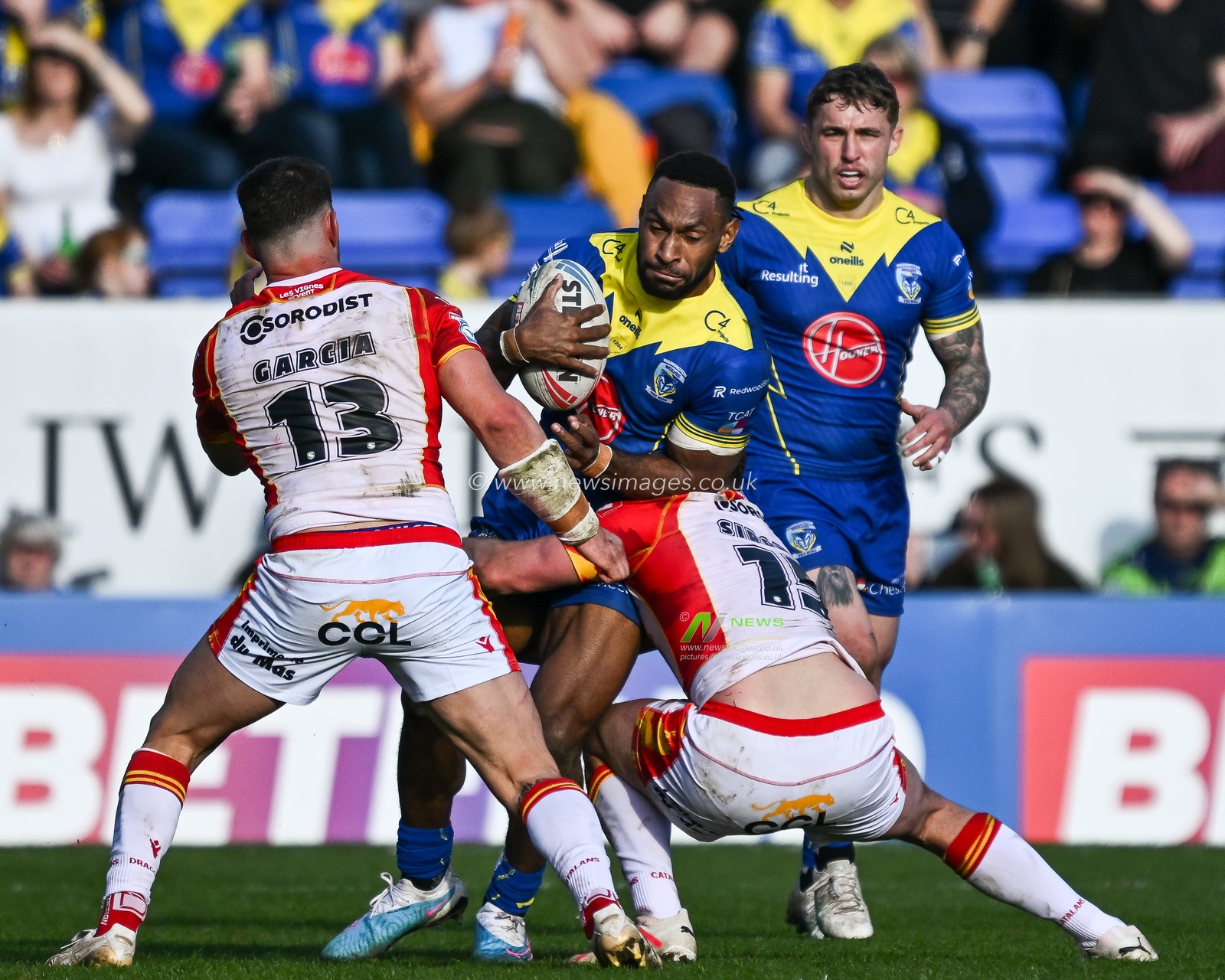 Rodrick Tai of Warrington Wolves is tackled by Bayley Sironen of Catalan Dragons during the Betfred Super League match Warrington Wolves vs Catalans Dragons at Halliwell Jones Stadium, Warrington, United Kingdom, 30th March 2024

(Photo by Craig Thomas/News Images)