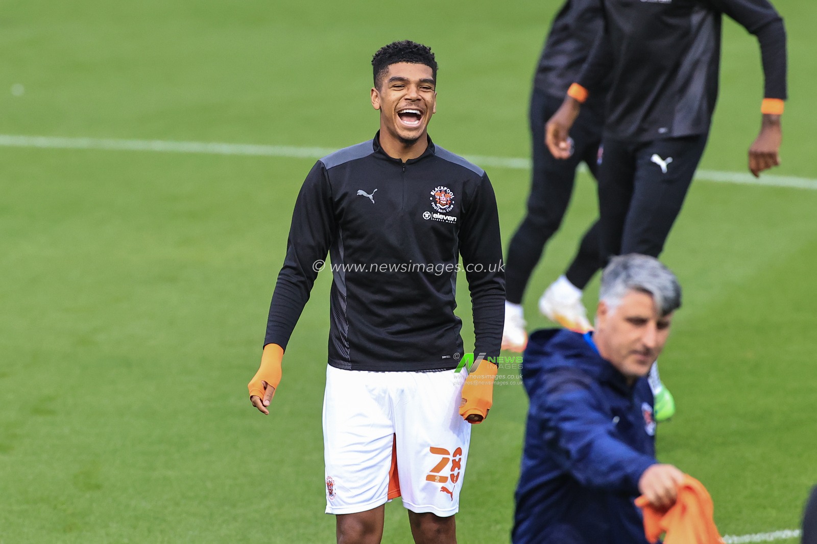 Tyreece John-Jules #28 of Blackpool full of smiles during the pre-game warmup