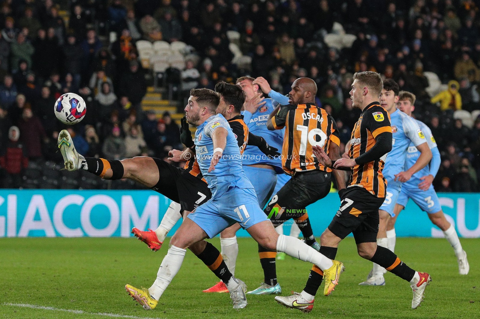 Ozan Tufan #7 of Hull City sticks a foot out and scores to make it 1-1 in the second half of the Sky Bet Championship match Hull City vs Sunderland at MKM Stadium, Hull, United Kingdom, 17th December 2022

(Photo by James Heaton/News Images)