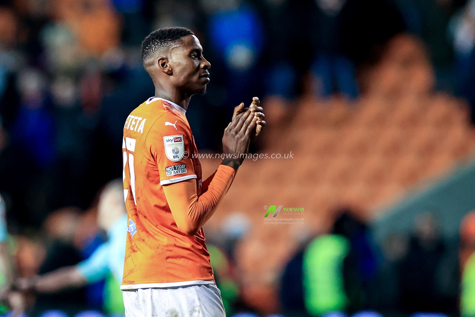 Marvin Ekpiteta #21 of Blackpool  applauds the fans after Blackpool hold West Bromwich Albion to a 0-0 draw
