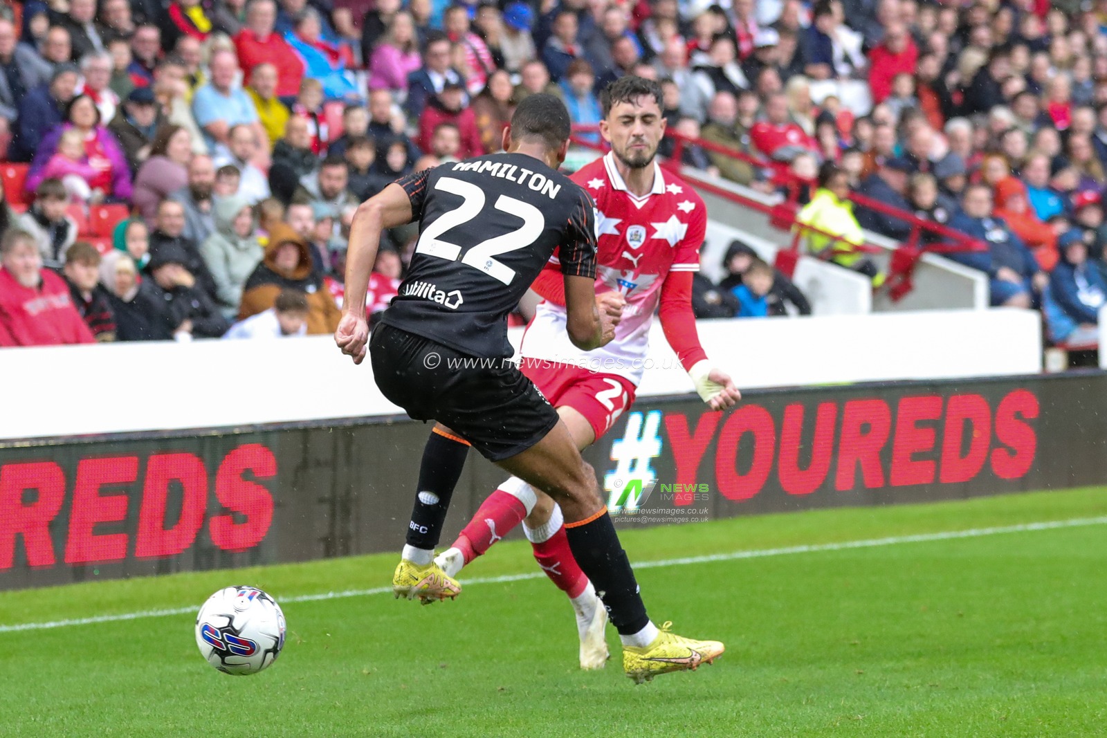 Corey O'Keeffe #22 of Barnsley blocks a pass from CJ Hamilton #22 of Blackpool during the Sky Bet League 1 match Barnsley vs Blackpool at Oakwell, Barnsley, United Kingdom, 30th September 2023

(Photo by Alfie Cosgrove/News Images)
