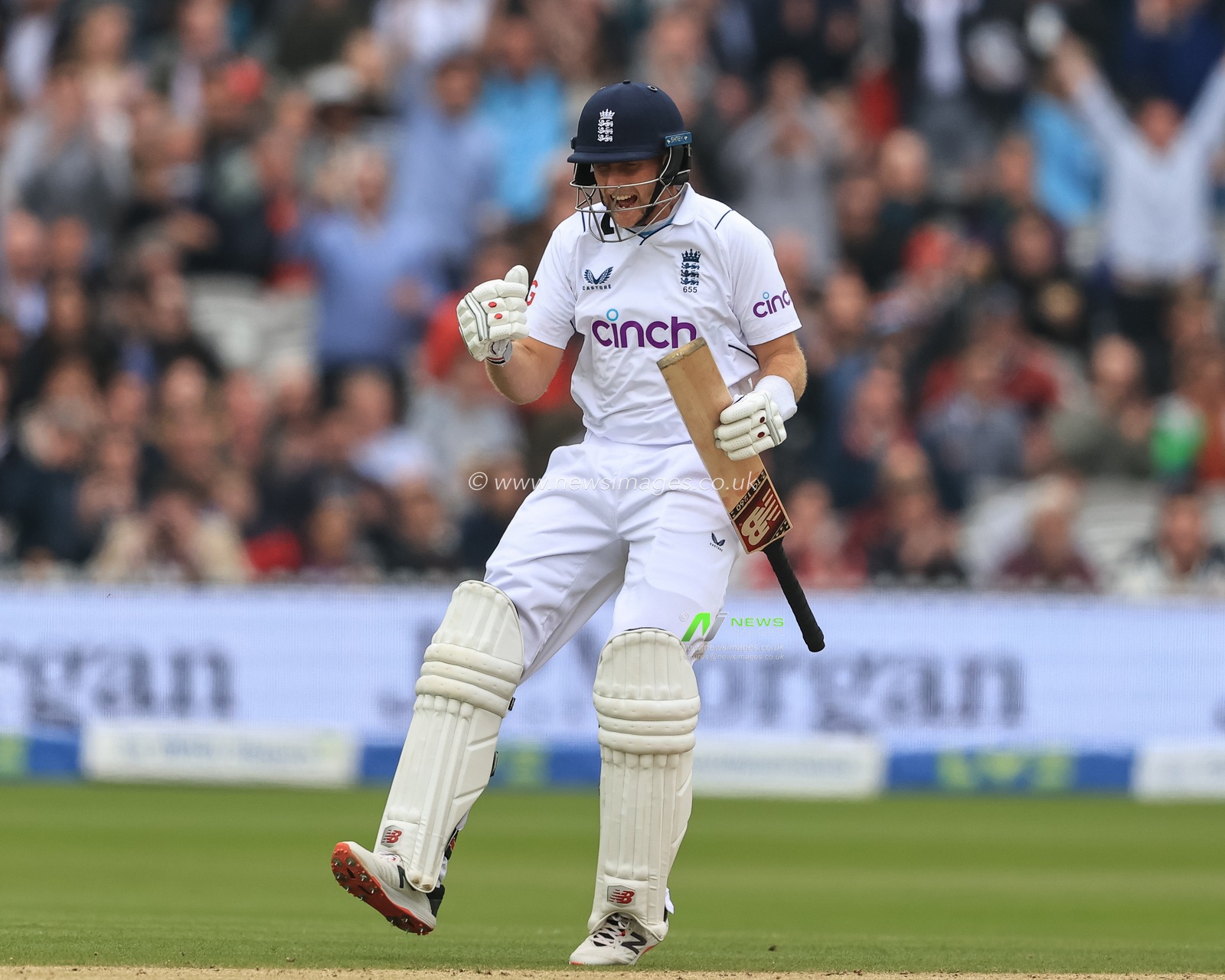 Joe Root of England hits a four to win the test one day four
