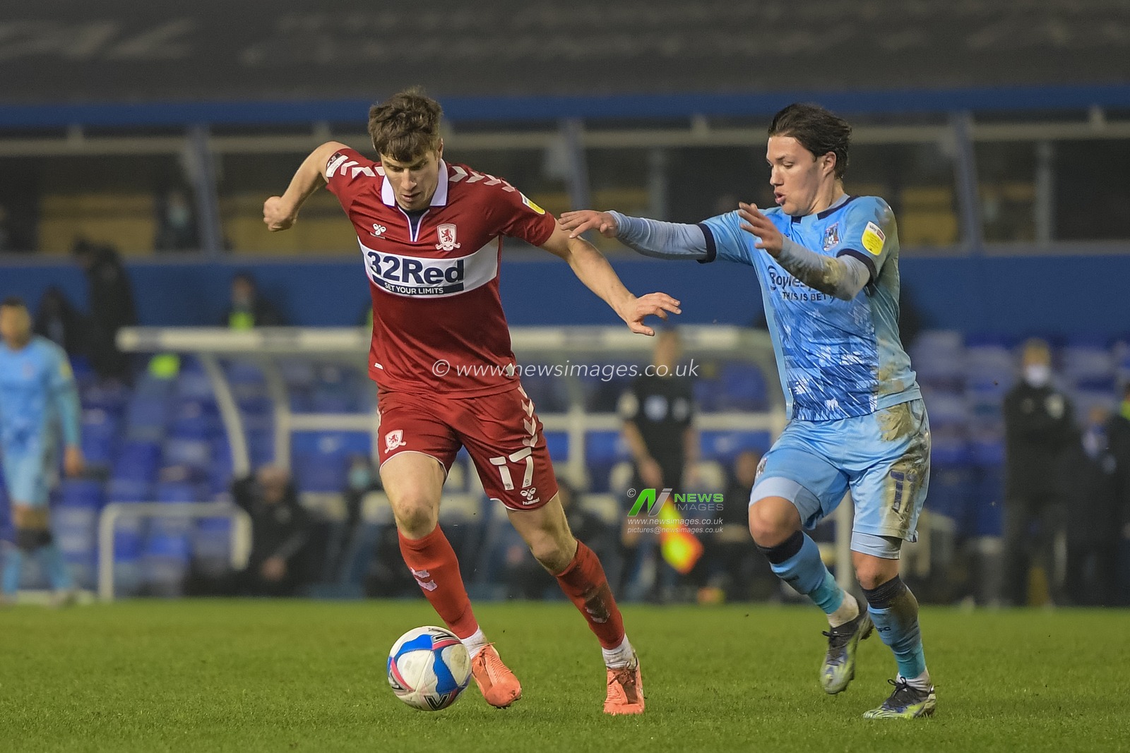 Paddy McNair #17 of Middlesbrough and Callum O'Hare #11 of Coventry City battle for the ball