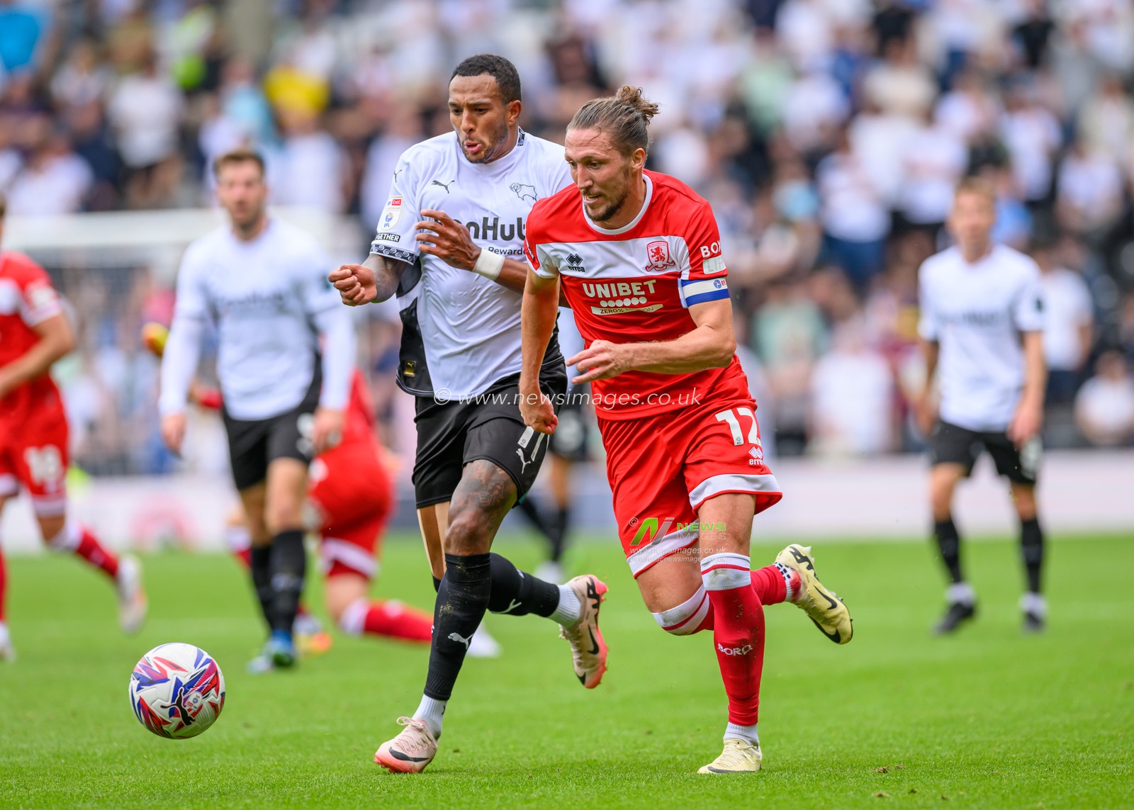 Nathaniel MENDEZ-LAING of Derby County FC attacking with the ball with Luke Ayling of Middlesbrough during the Sky Bet Championship match Derby County vs Middlesbrough at Pride Park Stadium, Derby, United Kingdom, 17th August 2024

(Photo by Mark Dunn/News Images)