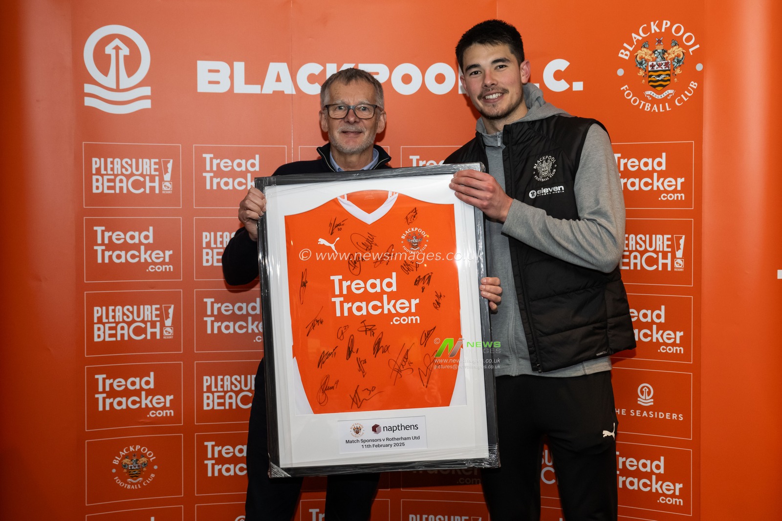 Elkan Baggott of Blackpool presents todays match sponsor a signed shirt after the Sky Bet League 1 match Blackpool vs Rotherham United at Bloomfield Road, Blackpool, United Kingdom, 11th February 2025

(Photo by Craig Thomas/News Images)