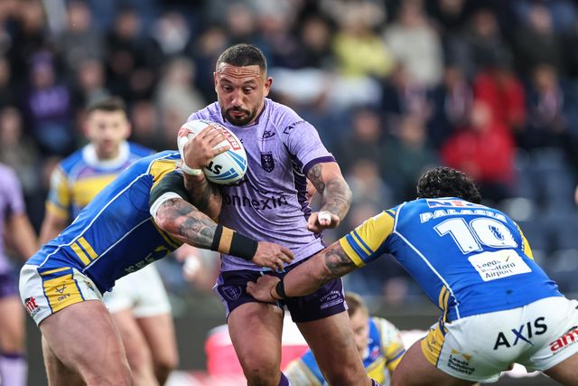 Elliot Minchella of Hull KR is tackled by ,Keenan Palasia during the Betfred Super League round 9 match Leeds Rhinos vs Hull KR at Headingley Stadium, Leeds, United Kingdom, 25th April 2025

(Photo by Mark Cosgrove/News Images)