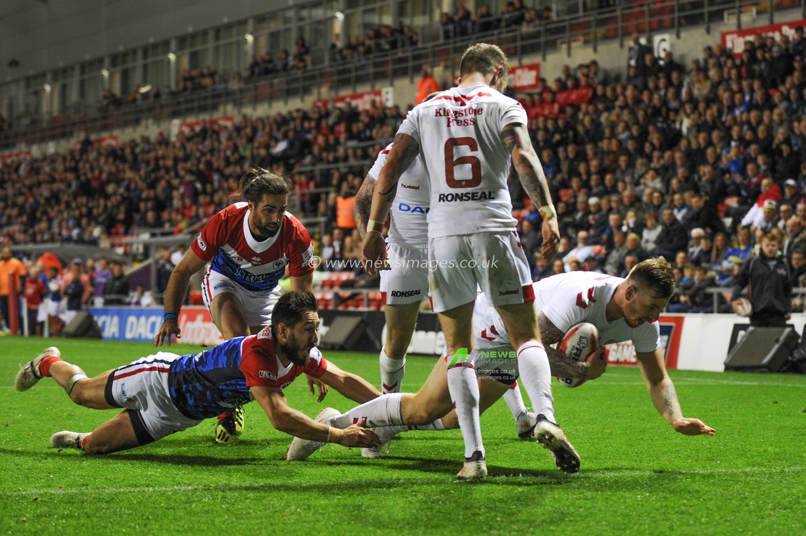 17th October 2018 , Leigh Sports Village,  Leigh, England;  Rugby League International, England v France ; Tom Johnstone of England (Wakefield Trinity) scores his third try


Credit:   Richard Long/News Images