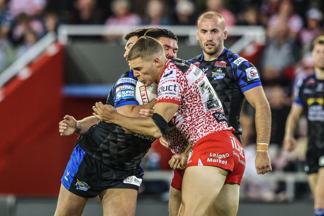 James Bentley of Leeds Rhinos is tackled during the Betfred Super League round 21 match Leigh Leopards vs Leeds Rhinos at Leigh Sports Village, Leigh, United Kingdom, 7th August 2025

(Photo by Alfie Cosgrove/News Images)