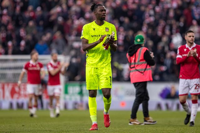 Wrexham's Arthur Okonkwo celebrates victory during the Sky Bet League 1 match Wrexham vs Stockport County at SToK Cae Ras, Wrexham, United Kingdom, 22nd March 2025

(Photo by Nik Mesney/News Images)