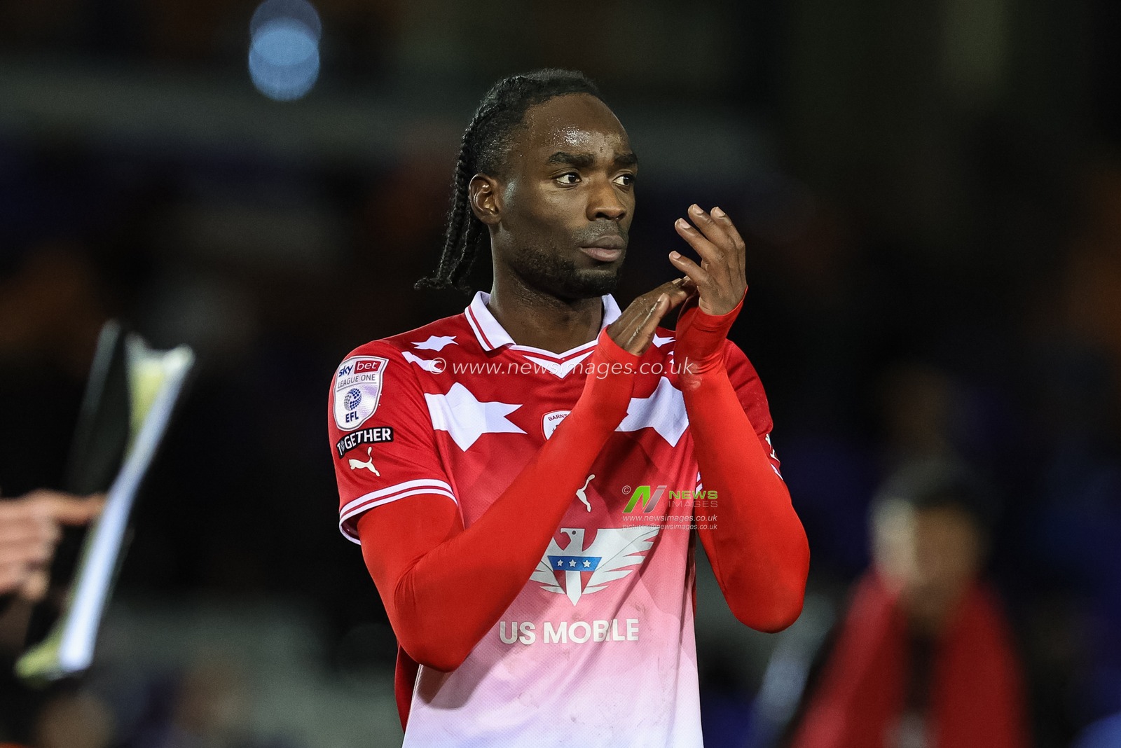 Devante Cole #44 of Barnsley applauds the travelling fans during the Sky Bet League 1 match Peterborough United vs Barnsley at Weston Homes Stadium, Peterborough, United Kingdom, 29th December 2023

(Photo by Mark Cosgrove/News Images)