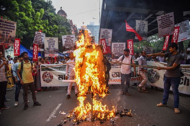 Activists from the Socialist Unity Centre of India (SUCI) burned an effigy of U.S. President Donald Trump and Israeli Prime Minister Benjamin Netanyahu during an anti-Israel protest to express solidarity with Palestinians, in Kolkata on October 7, 2025.Photo by Debajyoti Chakraborty.(Photo: Debajyoti Chakraborty/News Images)