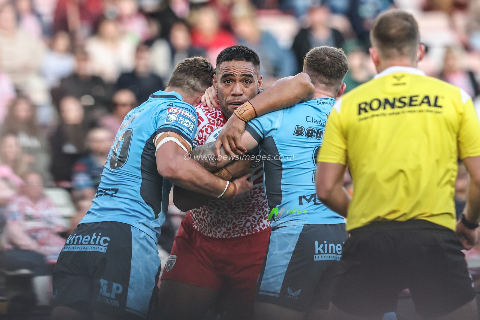 Joe Ofahengaue of Leigh Leapords is tackled during the Betfred Super League Round 12 match Leigh Leopards vs Hull FC at Leigh Sports Village, Leigh, United Kingdom, 22nd May 2025

(Photo by Alfie Cosgrove/News Images)